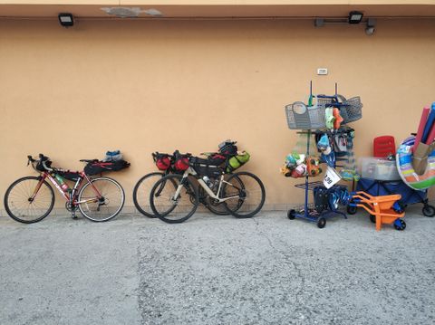 Photo of 3 road bikes in front of a store