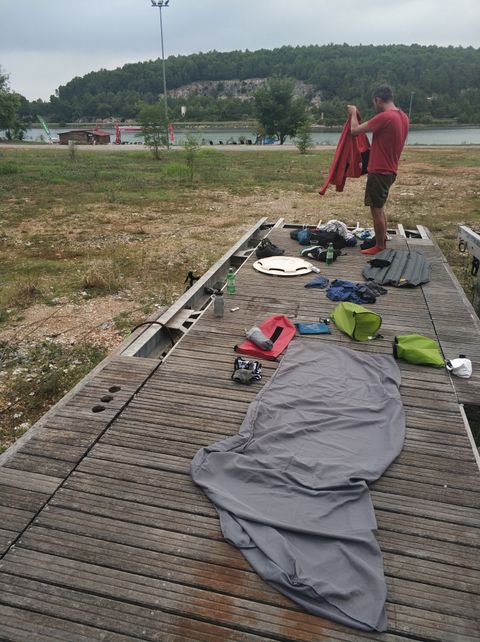 Photo of our makeshift camp on an old ponton bridge near Tar